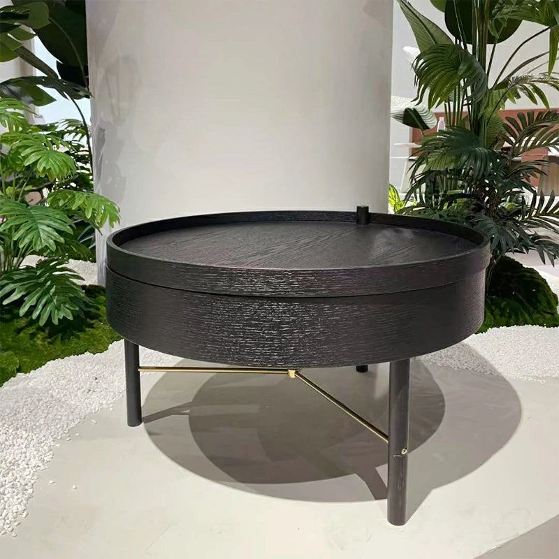 Table basse moderne à plateau rotatif en bois rond avec rangement et pieds en métal naturel